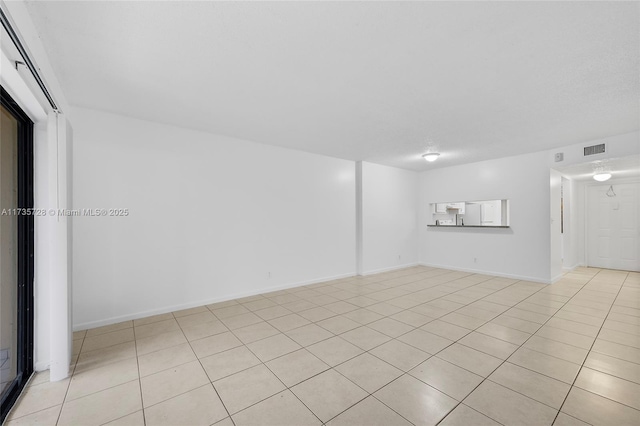 6575 W Oakland Park Blvd Unit 114, Lauderhill, FL 33313 - empty room featuring light tile patterned flooring