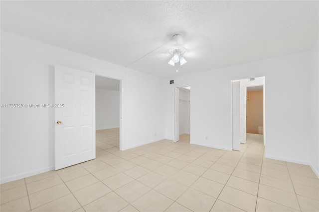 6575 W Oakland Park Blvd Unit 114, Lauderhill, FL 33313 - spare room featuring ceiling fan and light tile patterned flooring
