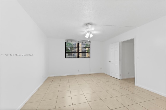 6575 W Oakland Park Blvd Unit 114, Lauderhill, FL 33313 - spare room featuring a ceiling fan, light tile patterned floors, and a textured ceiling