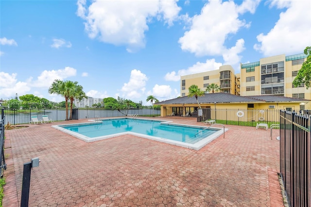 6575 W Oakland Park Blvd Unit 114, Lauderhill, FL 33313 - community pool featuring a patio area