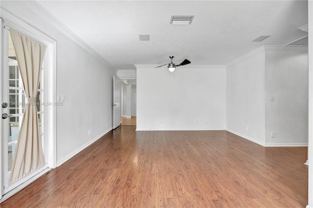 unfurnished room featuring wood-type flooring, ceiling fan, and crown molding