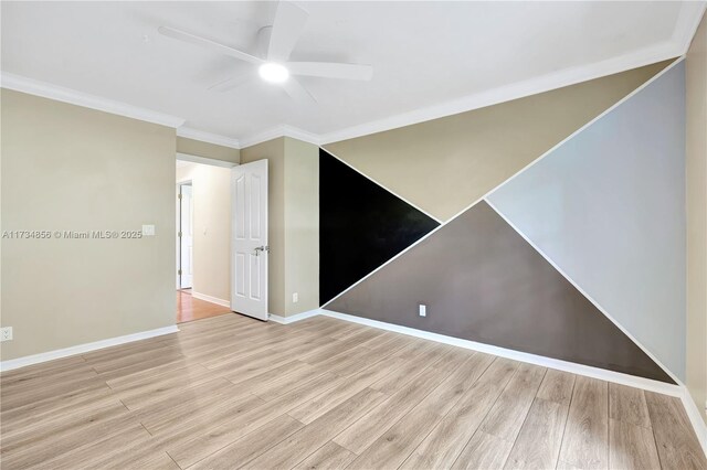 13230 N 153rd Rd N, Jupiter, FL 33478 - empty room featuring a ceiling fan, ornamental molding, wood finished floors, and baseboards
