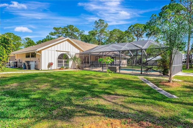 view of community with a yard and a swimming pool