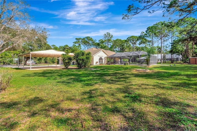 view of yard with a lanai and a gazebo