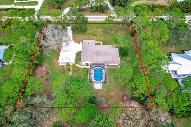 13230 N 153rd Rd N, Jupiter, FL 33478 - aerial view of property and surrounding area featuring property parcel outlined and a pool area