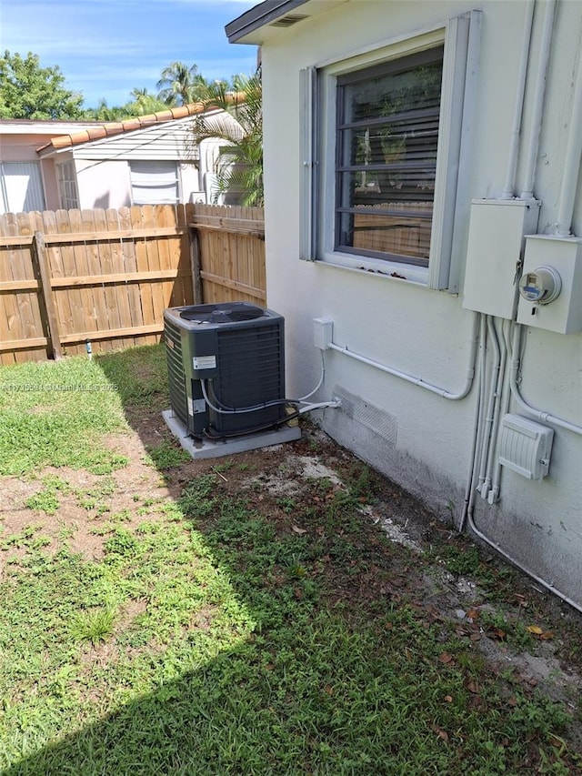 view of yard with central AC unit