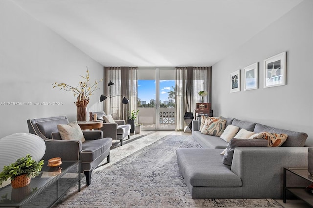 living room with floor to ceiling windows