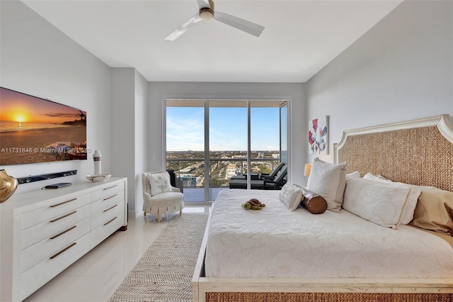 tiled bedroom featuring ceiling fan and access to outside