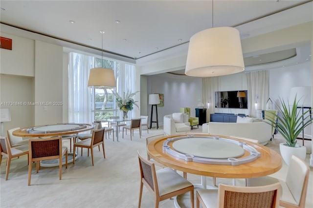 dining room with light colored carpet