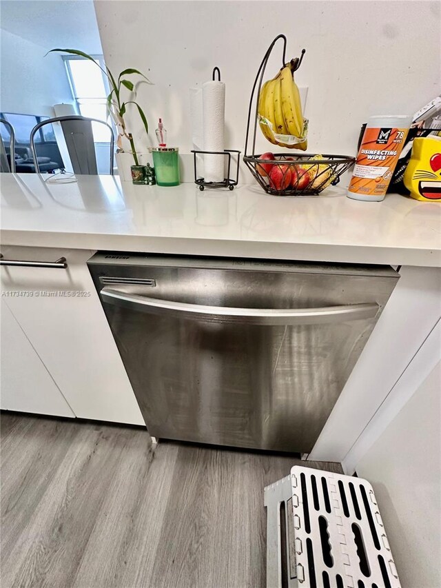 washroom featuring light tile patterned floors and washing machine and clothes dryer