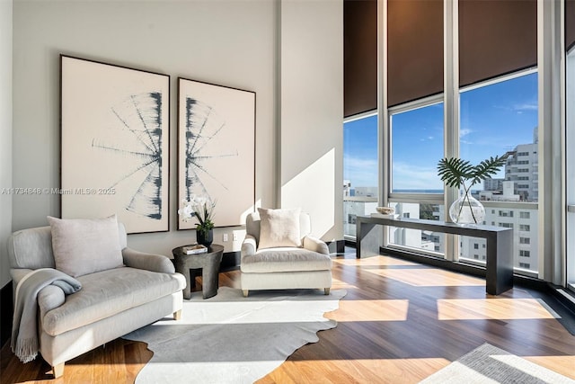 sitting room featuring light hardwood / wood-style floors