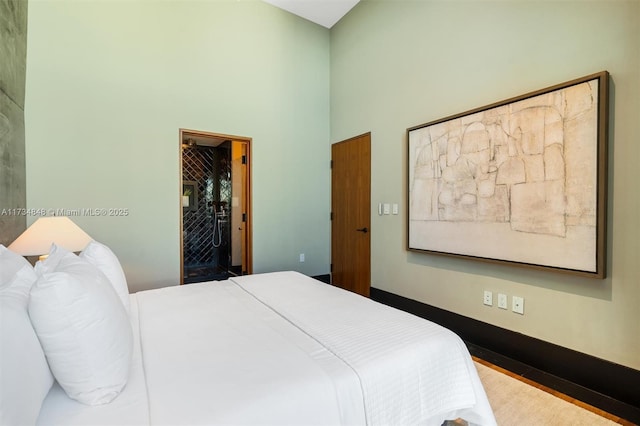 bedroom with a towering ceiling