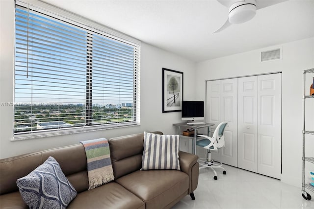 tiled office with ceiling fan