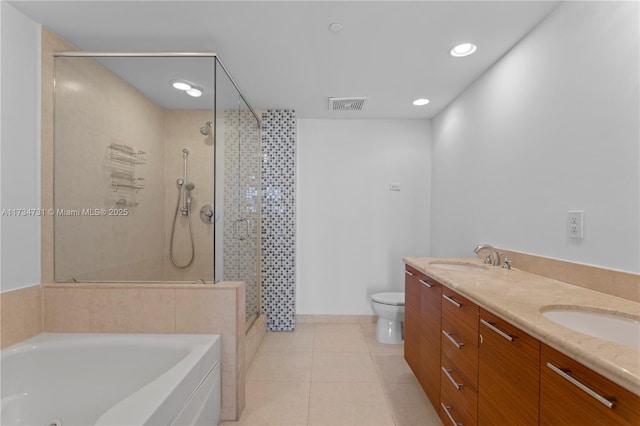 full bathroom featuring vanity, toilet, tile patterned flooring, and plus walk in shower