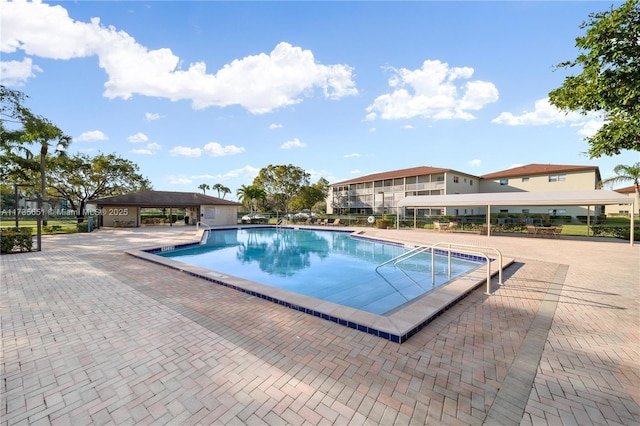 view of pool featuring a patio