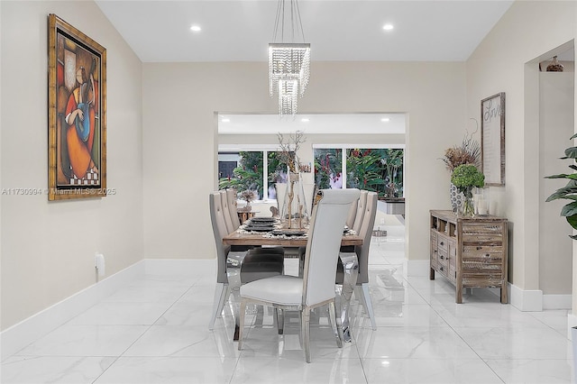 dining area with a notable chandelier