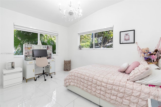 bedroom featuring vaulted ceiling and a notable chandelier