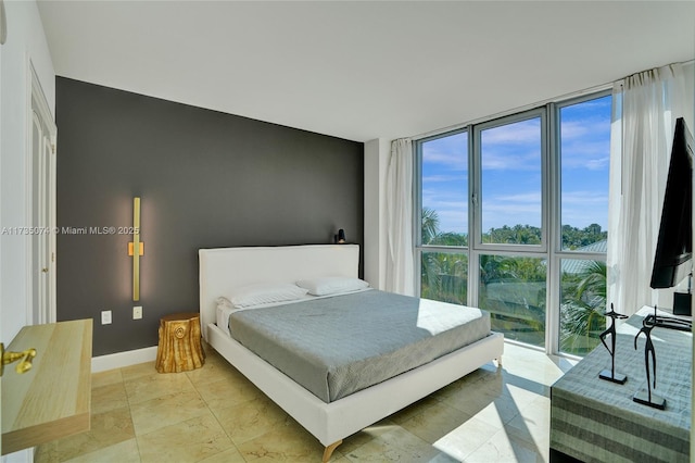 bedroom with expansive windows