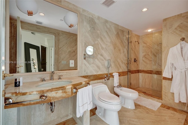 bathroom with a bidet, sink, tile walls, toilet, and walk in shower