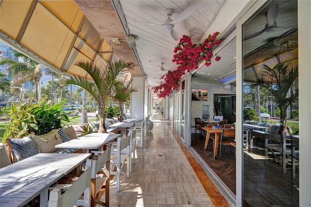 view of patio / terrace featuring ceiling fan