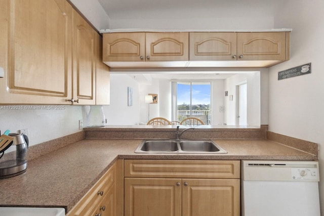 kitchen with sink, light brown cabinetry, and white dishwasher