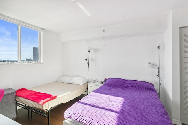 bedroom featuring hardwood / wood-style flooring