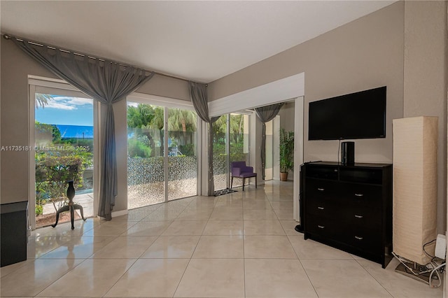 living room featuring light tile patterned flooring