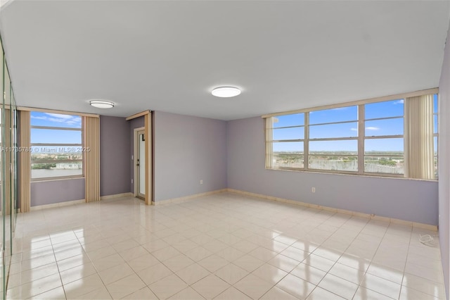 view of tiled spare room