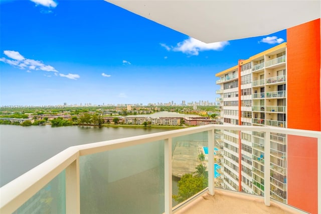 balcony featuring a water view