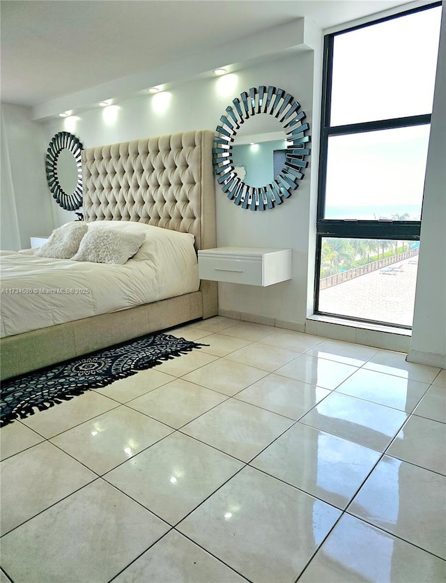 unfurnished bedroom with light tile patterned floors