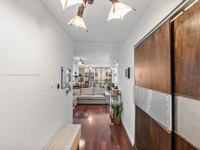 hall featuring dark wood-type flooring