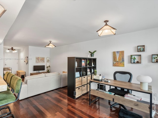 office with dark wood-type flooring