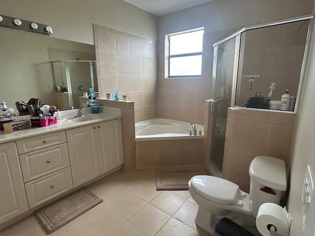 full bathroom with vanity, tile patterned floors, plus walk in shower, and toilet