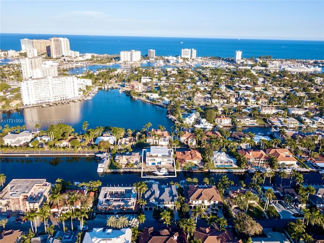 bird's eye view with a water view and a city view