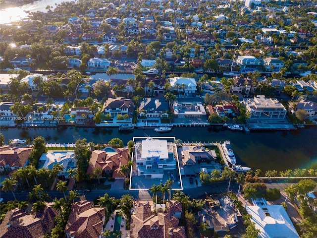 aerial view featuring a water view and a residential view