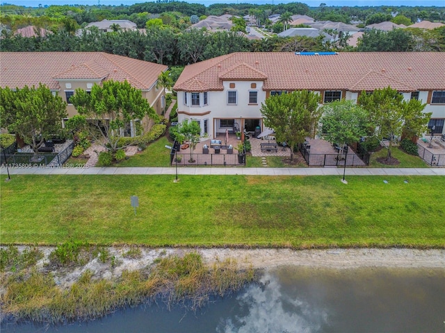 drone / aerial view with a water view