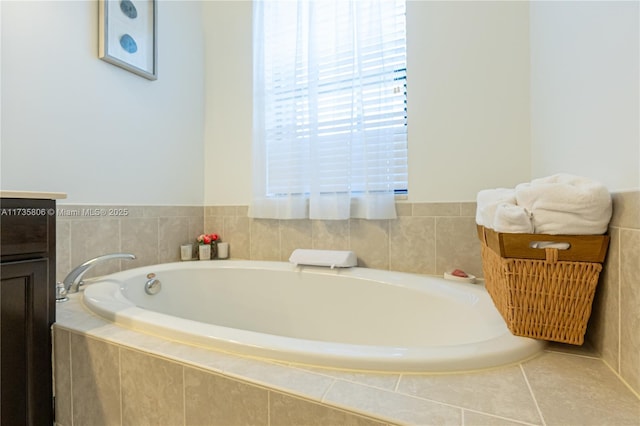 bathroom featuring tiled bath