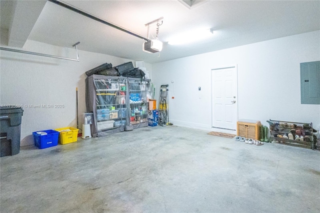 garage featuring a garage door opener and electric panel