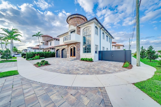 mediterranean / spanish-style house featuring a garage