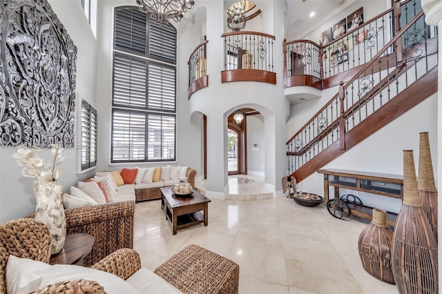 foyer featuring a chandelier and a high ceiling