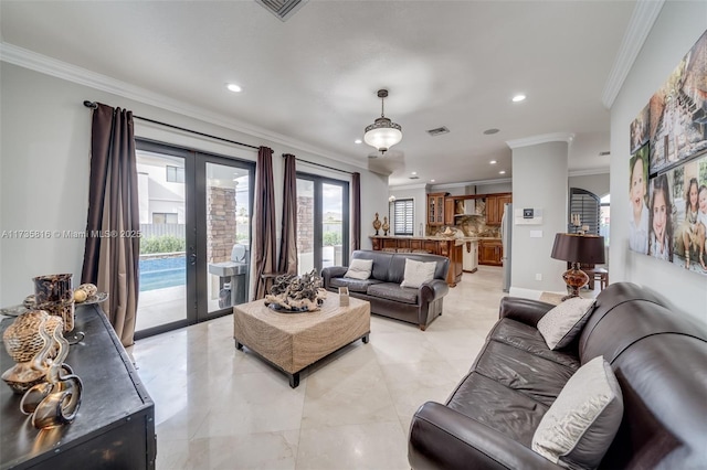 living room with crown molding and french doors