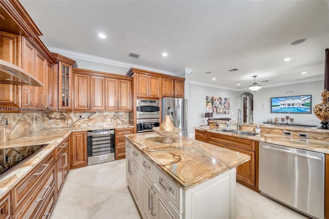 kitchen with wine cooler, sink, white cabinetry, stainless steel appliances, and light stone countertops