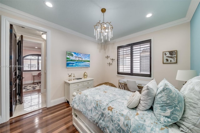 bedroom featuring ornamental molding, a notable chandelier, and dark hardwood / wood-style flooring