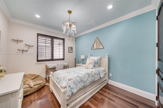 bedroom with dark wood-type flooring, ornamental molding, and a notable chandelier