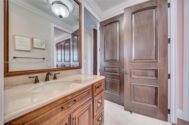 bathroom featuring vanity, ornamental molding, and tile patterned floors