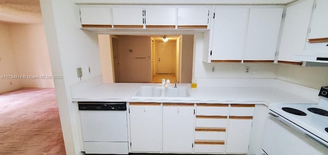 kitchen featuring white cabinetry, stove, light countertops, and dishwasher