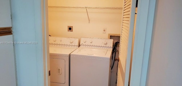 washroom with laundry area and separate washer and dryer