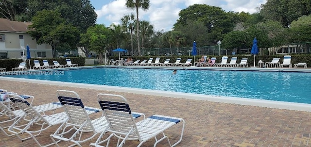 community pool with fence