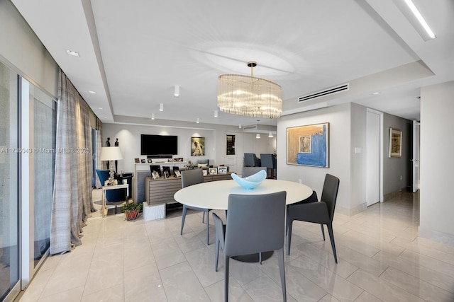 dining room featuring a notable chandelier