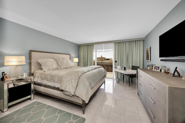 bedroom featuring light tile patterned floors